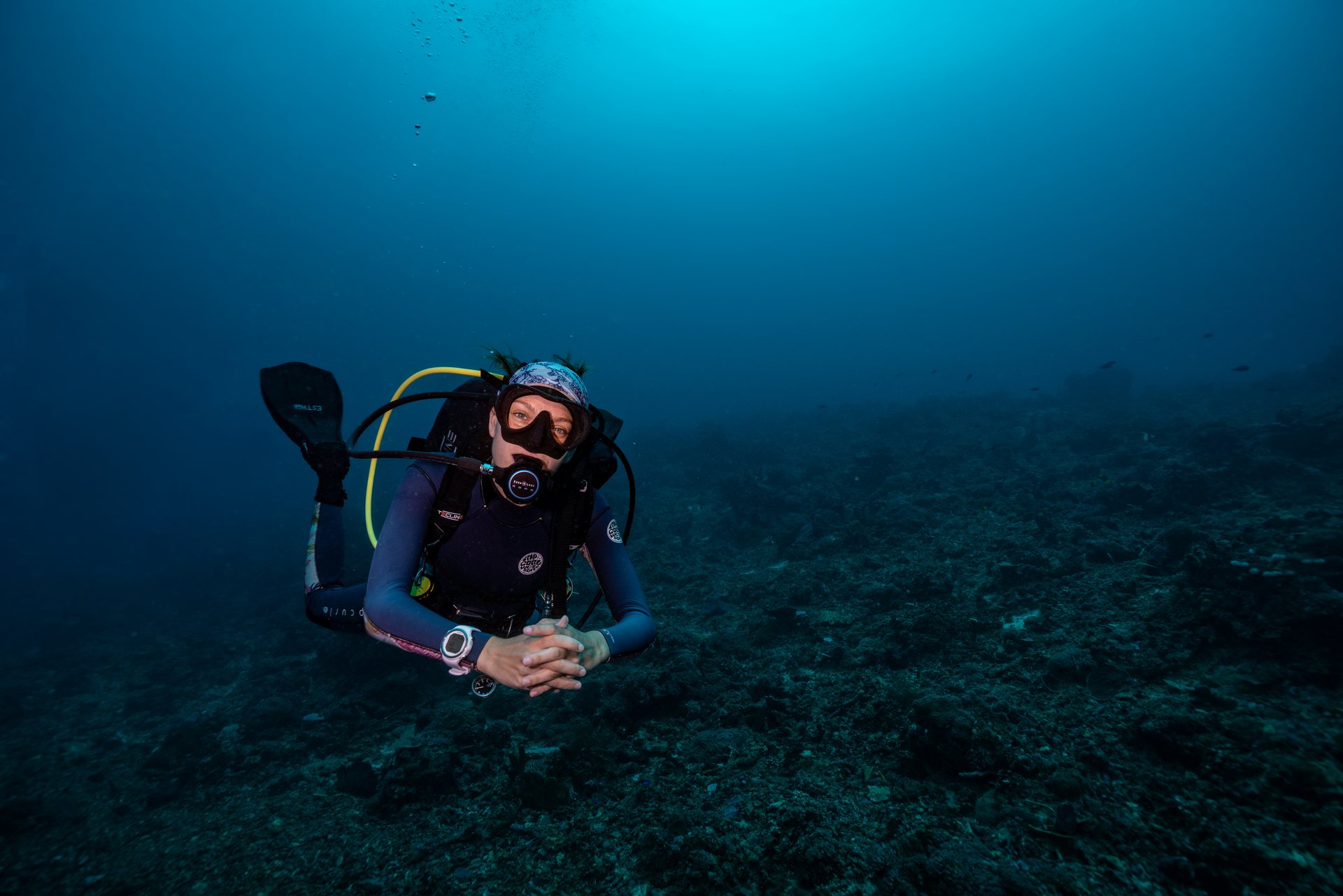Scuba diver demonstrating neutral buoyancy and good trim underwater