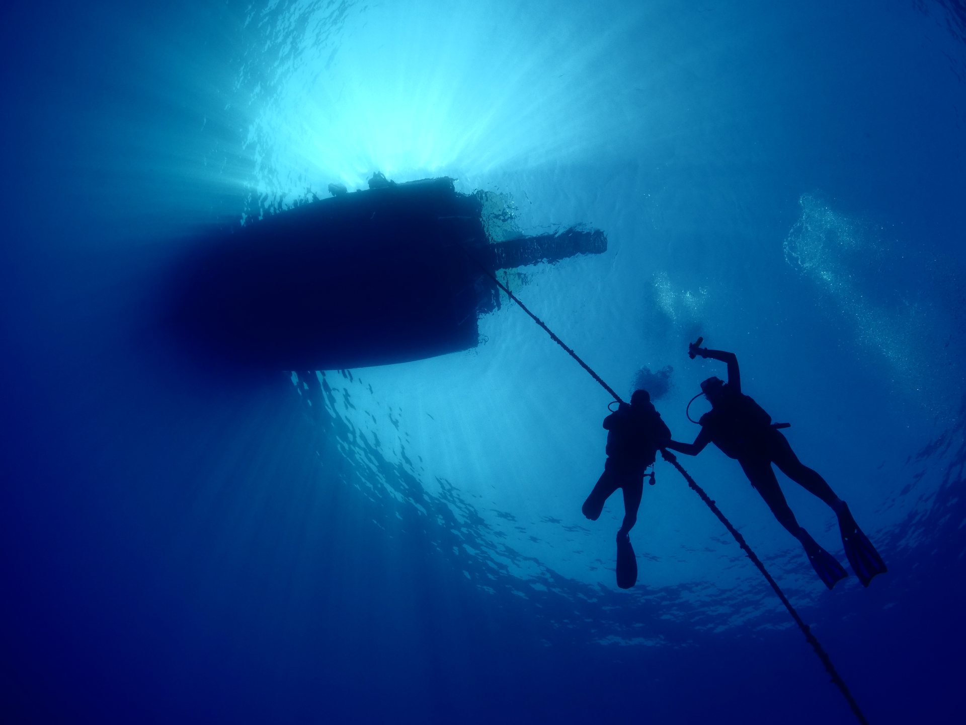 Confident scuba diver demonstrating good trim and buoyancy